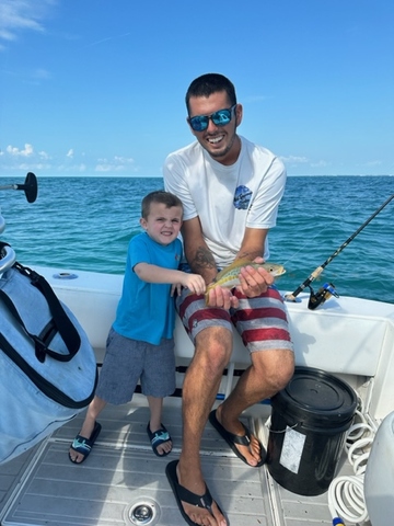 Kids catching yellowtail snapper